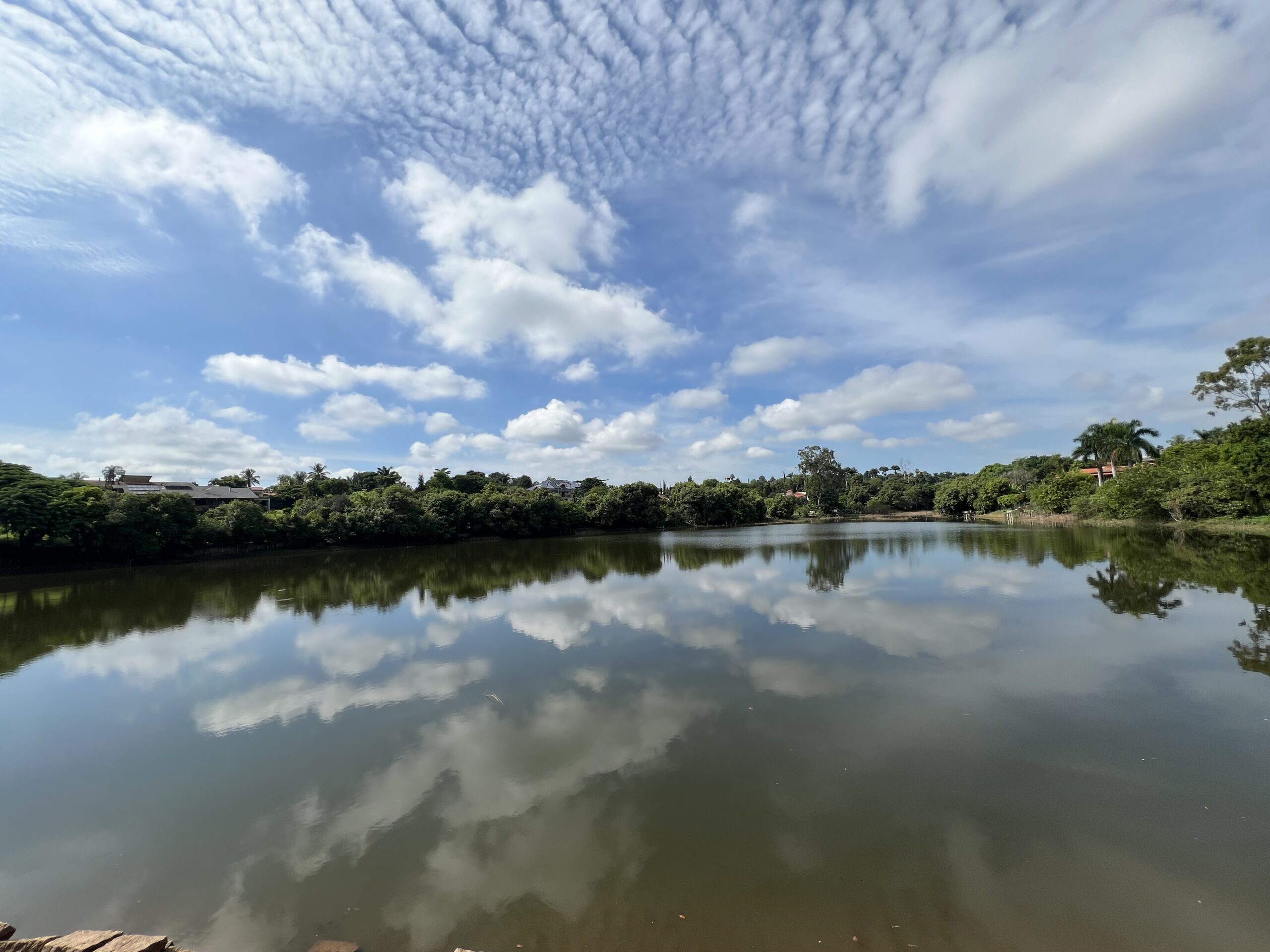 The fourth lake in Itaici - Das Flores clouds reflecting of the clear water.